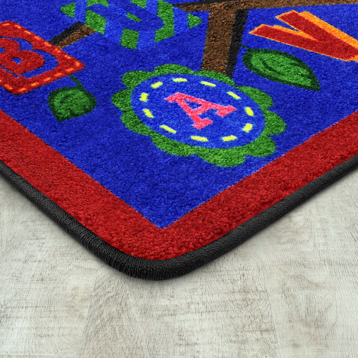 Alphabet Leaves 5'4in x 7'8in area rug in color Bold